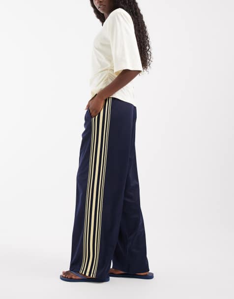 pantalones satinados de pernera ancha con rayas laterales en azul marino - view 1