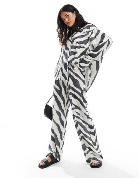 Pantalones sin cierres con estampado de cebra de mezcla de lino de ASOS DESIGN - view 1