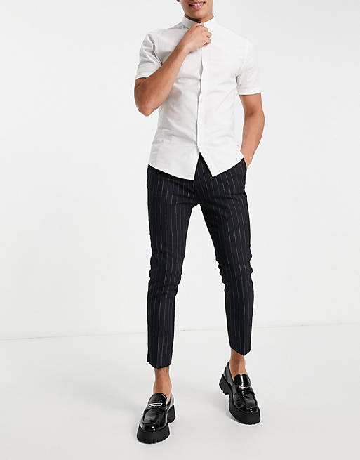 Hombre Other | Pantalones tapered de vestir con diseño a rayas en azul marino de ASOS DESIGN - SU39464