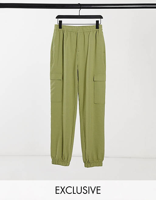 Pantalones utilitarios con microestampado de cuadros de COLLUSION Unisex