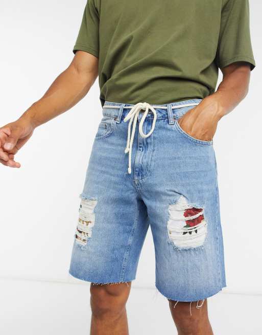 Pantalones vaqueros cortos de corte holgado en azul descolorido de Siksilk