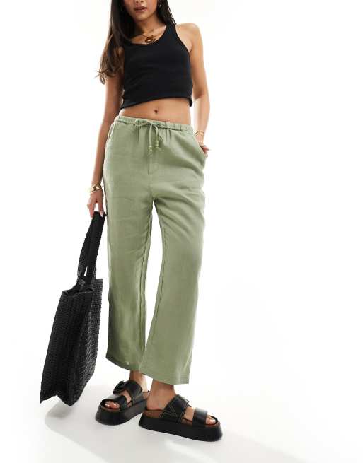 Pantalones verde claro con lazada en la cintura de lino de Mango