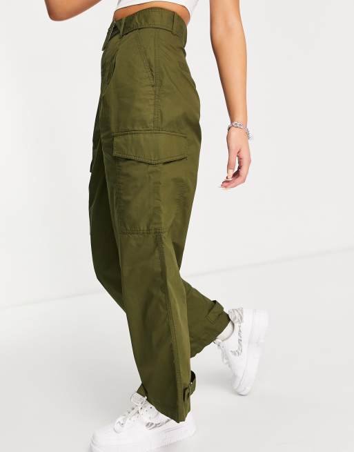 Pantalones verde oliva utilitarios con diseño ajustable en los tobillos de Tommy Jeans