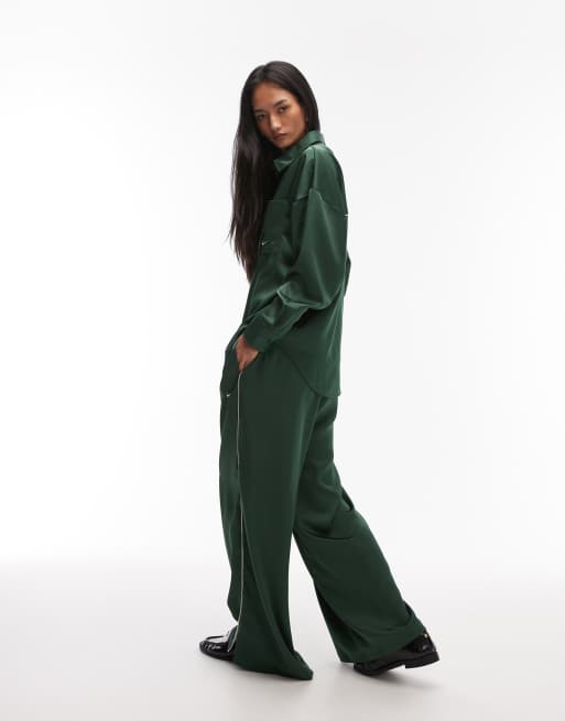 Pantalones verde oscuro de pernera ancha con detalle en la cinturilla de satén de Nike, 5 de 5