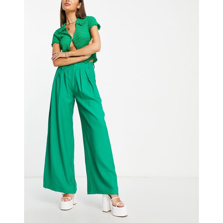 Pantalones verdes de corte palazzo de SNDYS ASOS