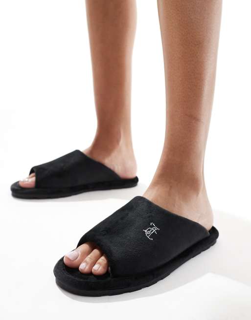 Pantuflas negras acolchadas de velour de Juicy Couture
