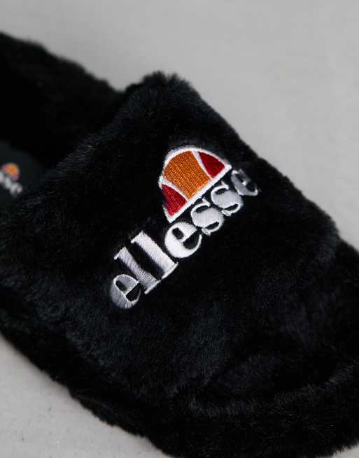 Pantuflas negras estilo sandalias de piel sintética Filippo de