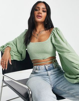 Parallel Lines crop top with strap detail and volume sleeve in green