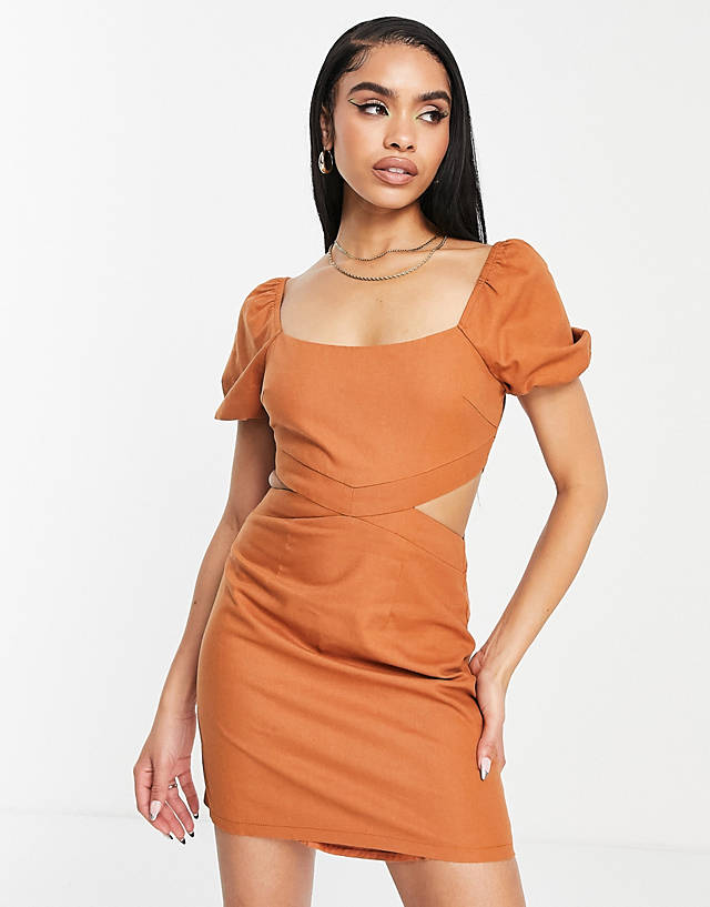 Parallel Lines - puff sleeve cut out mini dress in terracotta