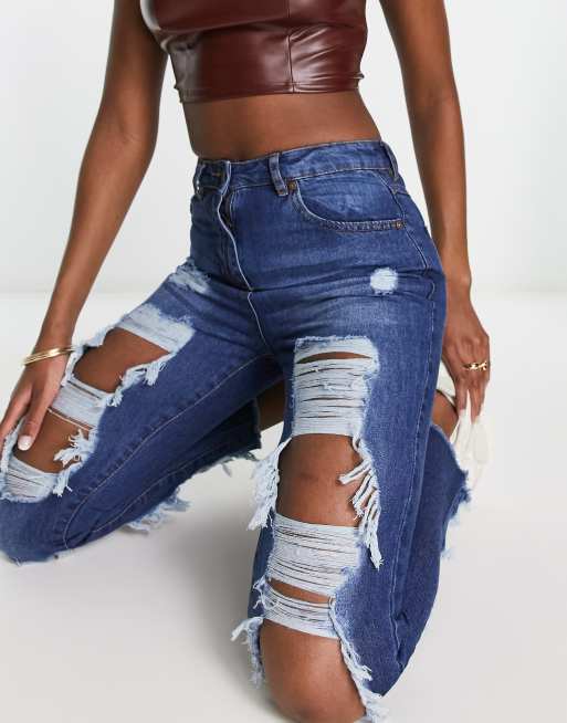 Ripped navy 2024 blue jeans