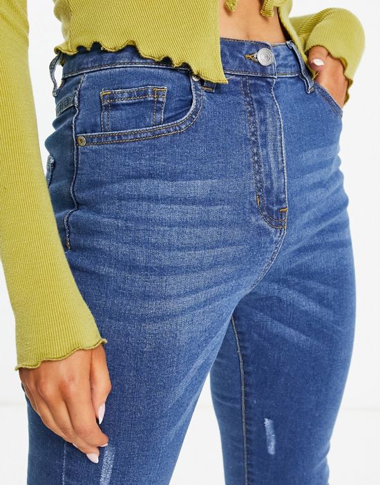 https://images.asos-media.com/products/parisian-front-split-flared-jeans-in-mid-blue/200974960-4?$n_550w$&wid=550&fit=constrain