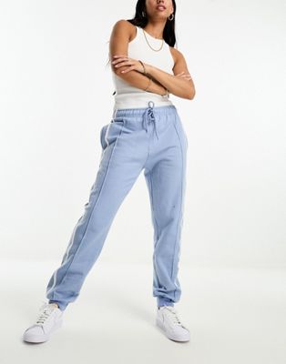 Parisian panelled joggers with side stripe in blue