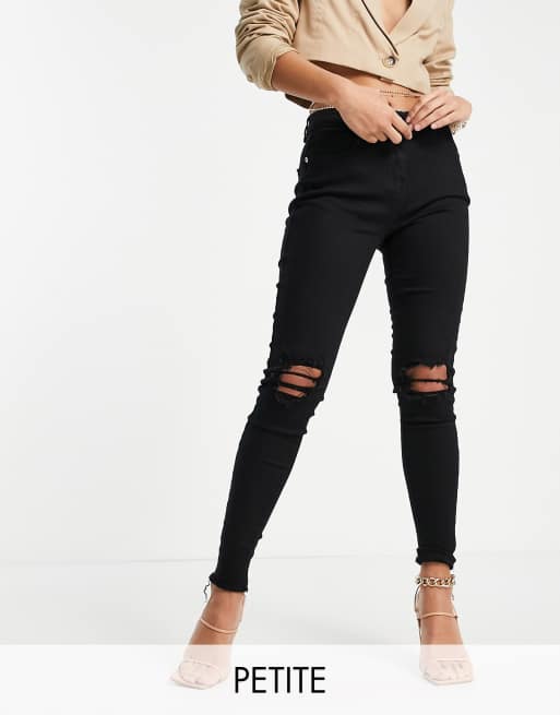 Black skinny jeans on sale with rips