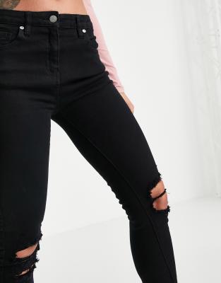 mid rise black ripped skinny jeans