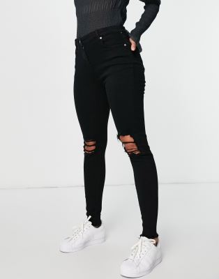 Parisian Skinny Jeans With Ripped Knee In Black