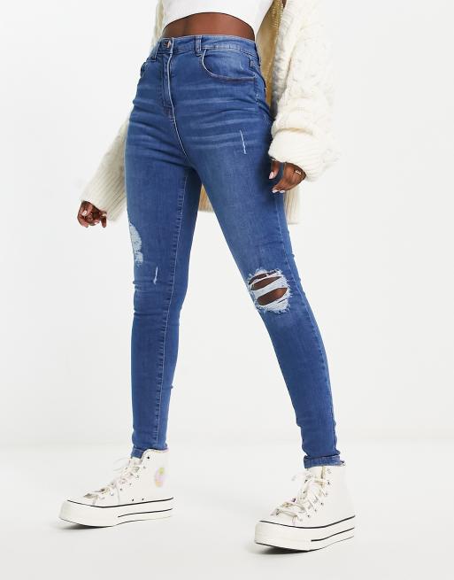 Parisian skinny jeans with rips in mid wash blue