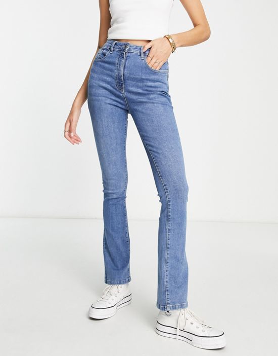 https://images.asos-media.com/products/parisian-tall-kick-flare-jeans-in-mid-blue/202439201-4?$n_550w$&wid=550&fit=constrain