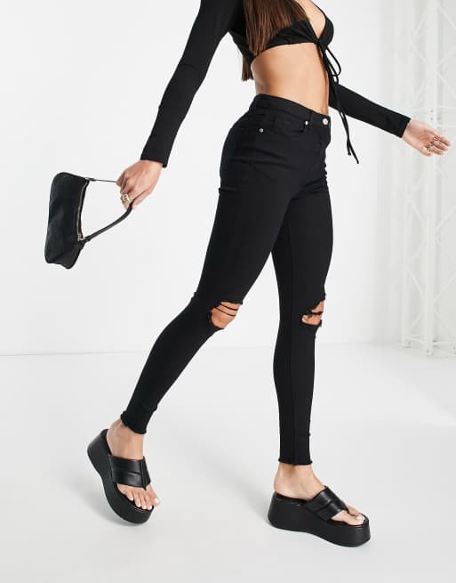 Black pants hot sale with ripped knees