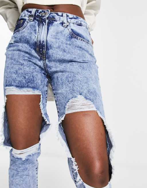 Thigh best sale ripped jeans