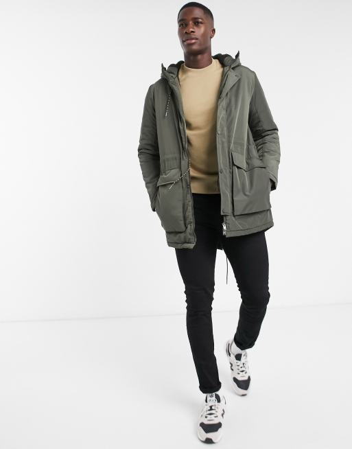 Parka acolchada de color caqui con capucha de borreguito de Selected Homme