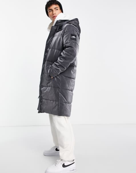 Parka larga blanca acolchada con capucha y acabado iridiscente de tejido grueso de Hollister - view 1