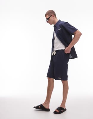 Parlez Parlez bayview logo detail seer sucker short co-ord in navy