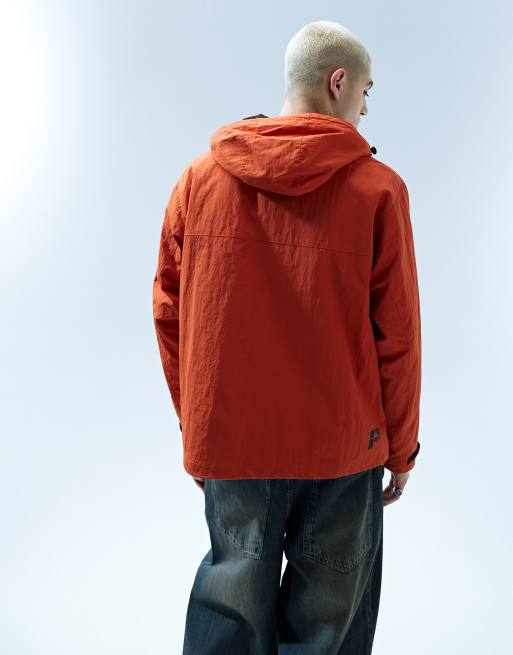 Parlez nylon rain jacket in burnt orange