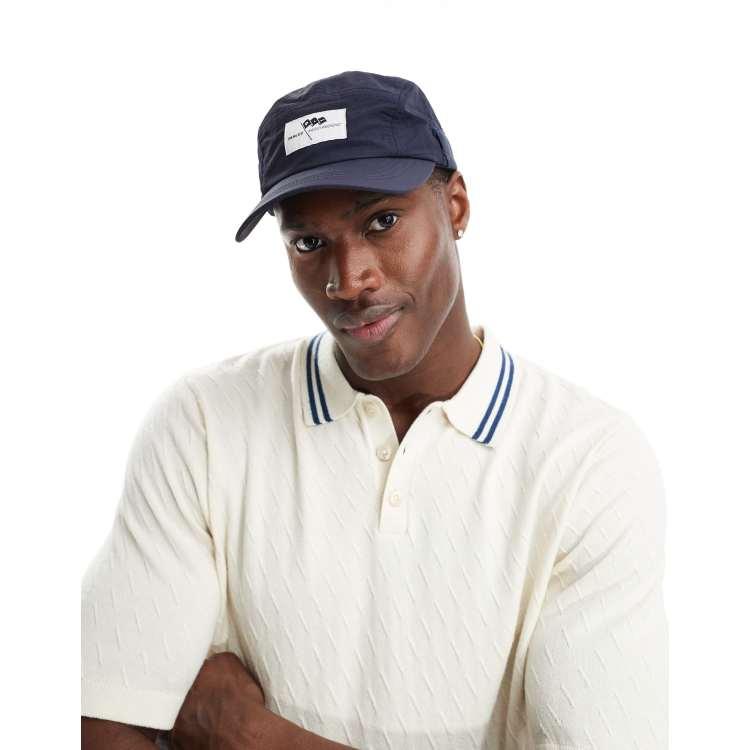 Parlez x Messy Weekend ripley nylon cap with toggle back in navy ASOS