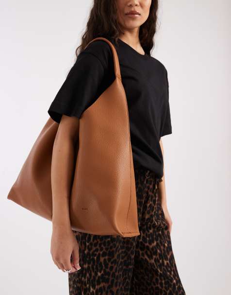 PASQ A-line soft panelled shoulder bag in tan - view 1