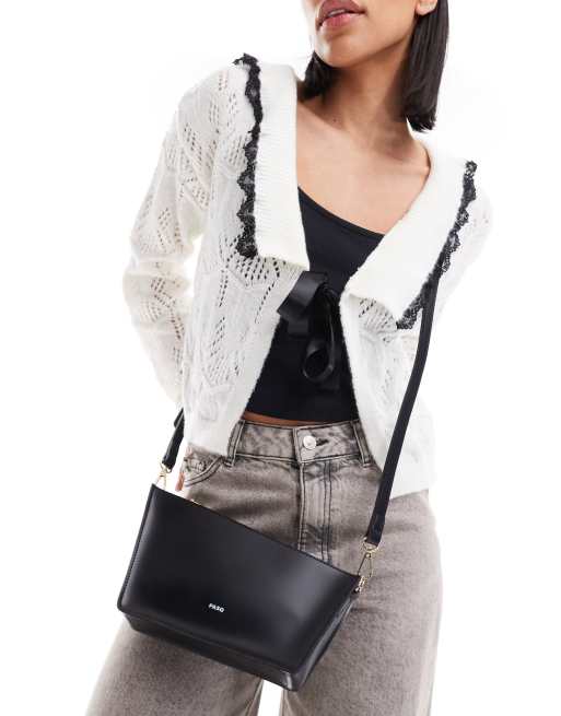 PASQ - Asymmetrische schoudertas met crossbody band in zwart