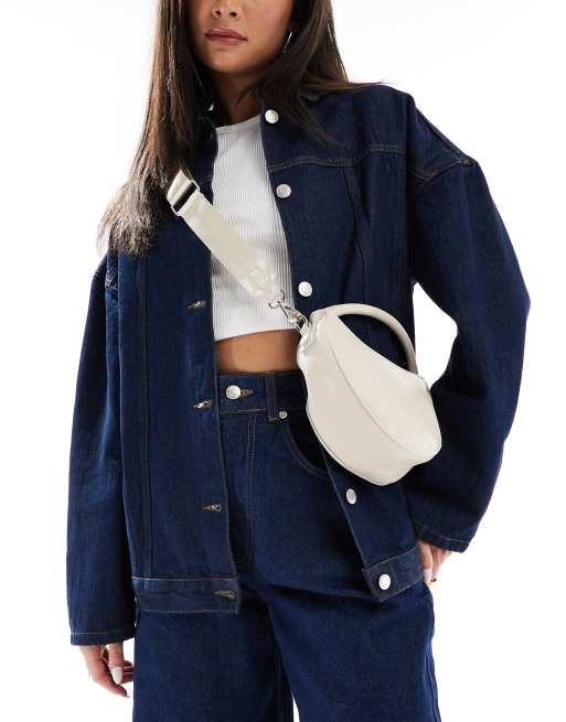 PASQ circle grab bag with crossbody strap in off-white