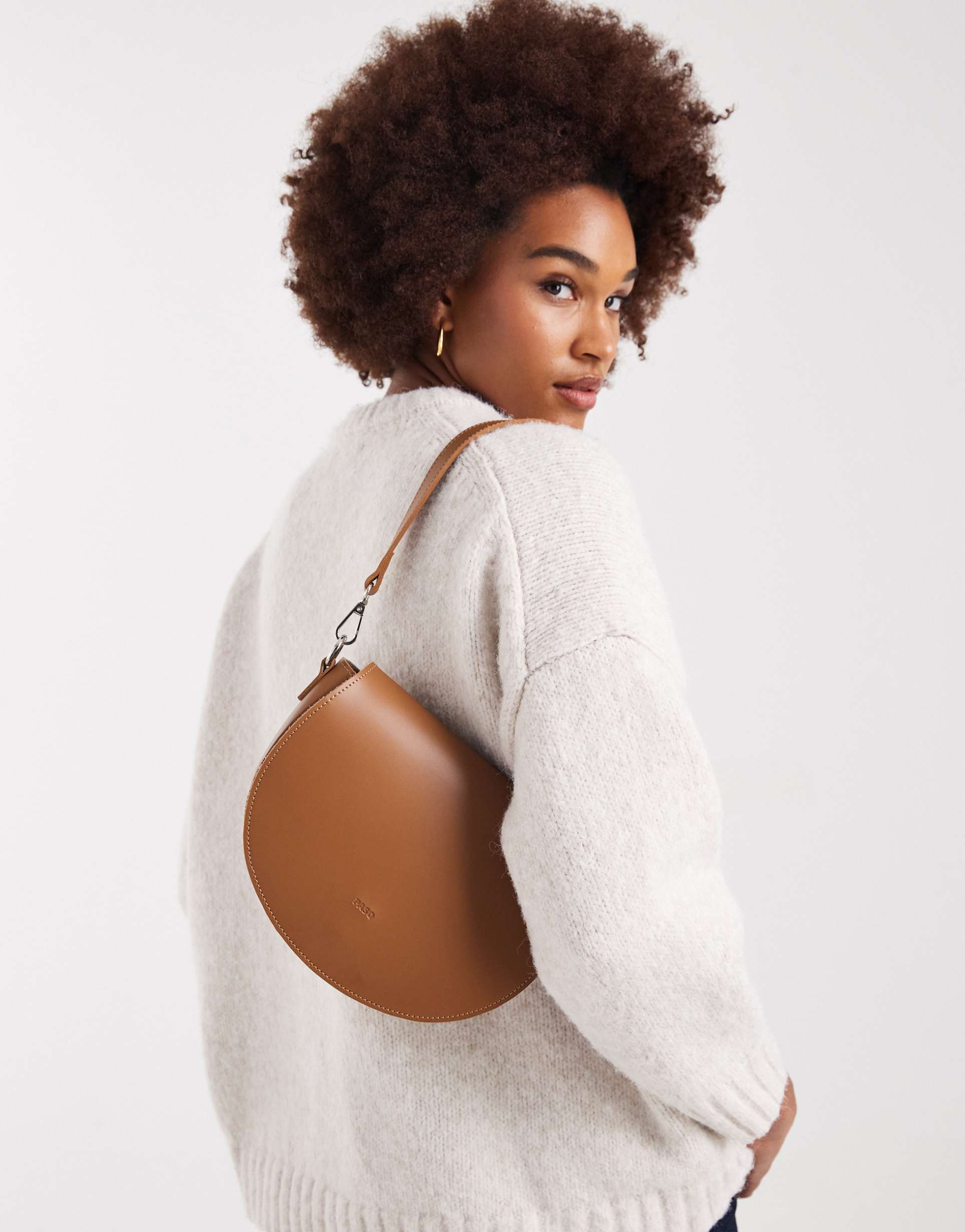 pasq curved shoulder and crossbody bag in tan