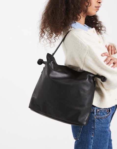 PASQ draw string soft shoulder bag in black - view 1