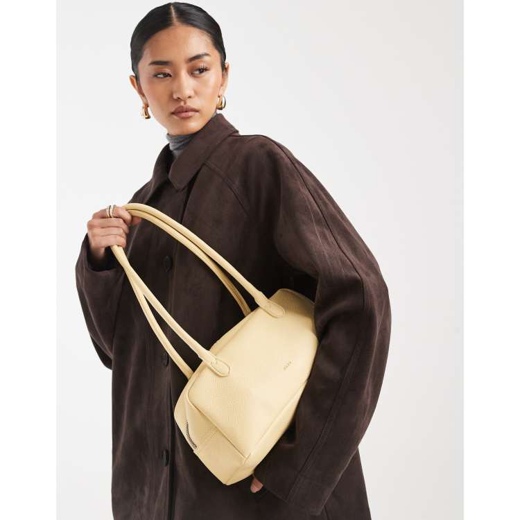 PASQ east to west shoulder bag in butter yellow | ASOS