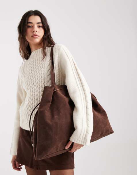 PASQ faux suede drawstring tote bag in dark brown - view 1