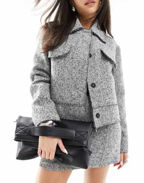 PASQ fold over clutch bag with crossbody strap in black - view 1
