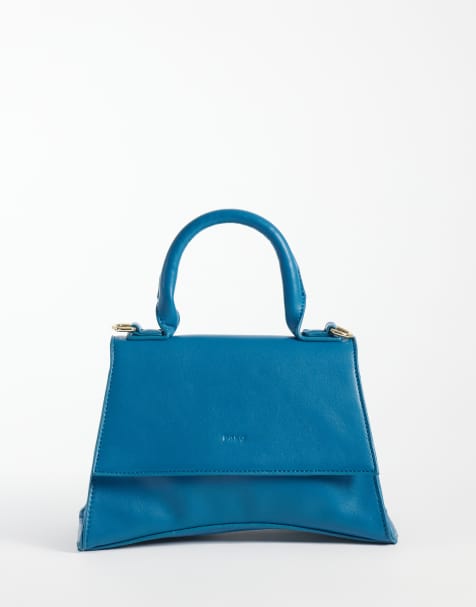PASQ mini curved bottom clutch purse with cross body strap in teal - view 1