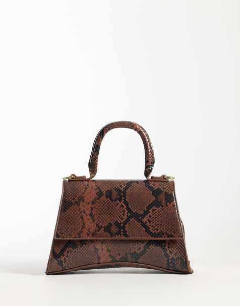 PASQ mini curved bottom grab bag with cross body strap in brown snake - view 1