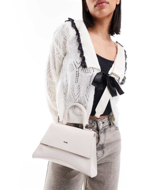 PASQ - Mini handtas met gebogen onderkant en crossbody band in gebroken wit
