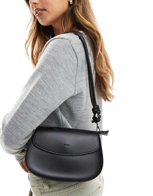 PASQ saddle shoulder bag with knot strap detail in black | ASOS