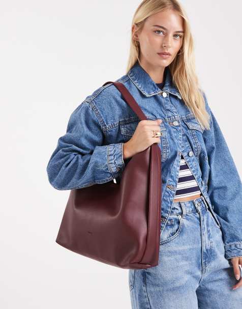PASQ slouch tote bag with strap detail in burgundy - view 1