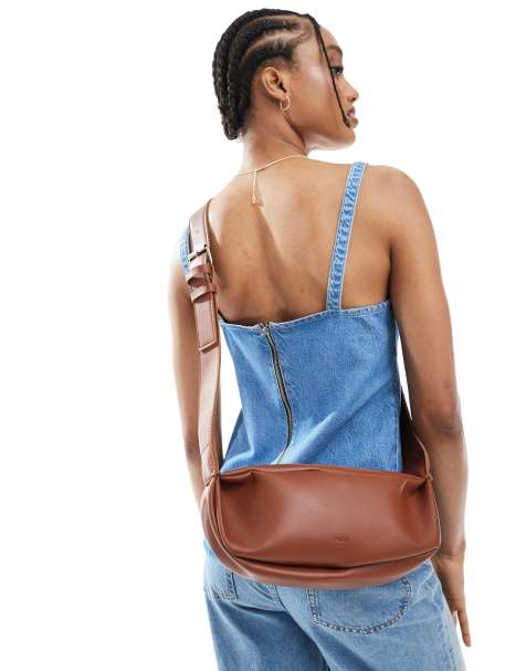 PASQ soft crossbody crescent bag in brown - view 1