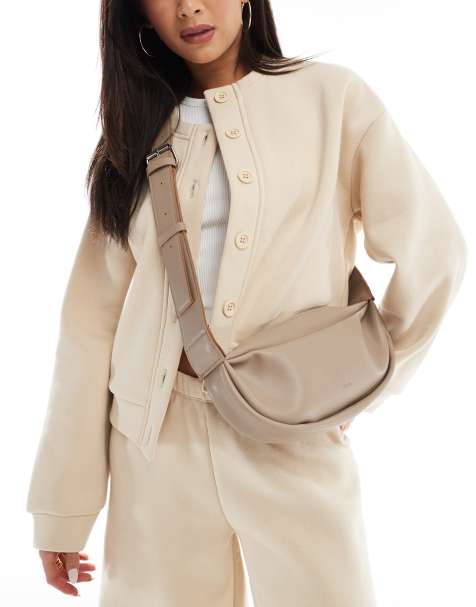 PASQ soft crossbody crescent bag in taupe - view 1