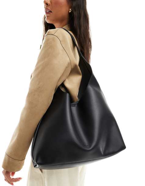 PASQ soft slouchy shoulder bag with strap detail in black - view 1