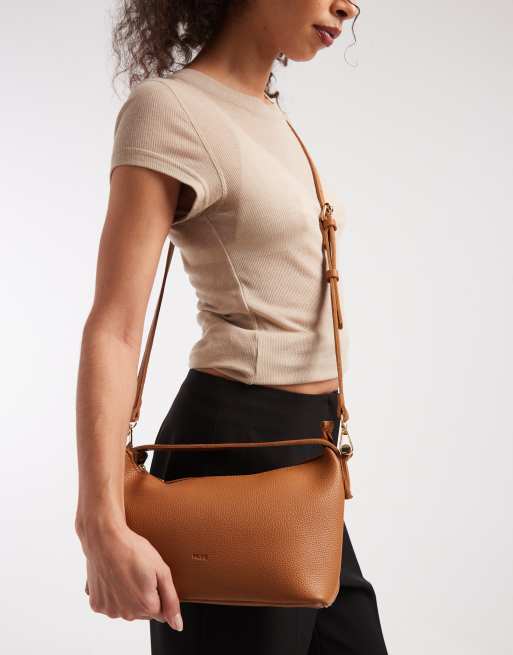 PASQ soft zip top grab bag with crossbody strap in tan, 2 of 4