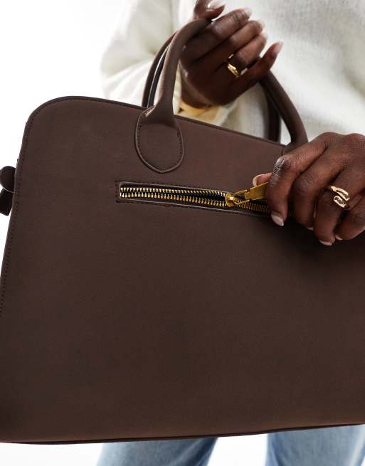 PASQ top handle tote bag with shoulder strap in brown faux suede