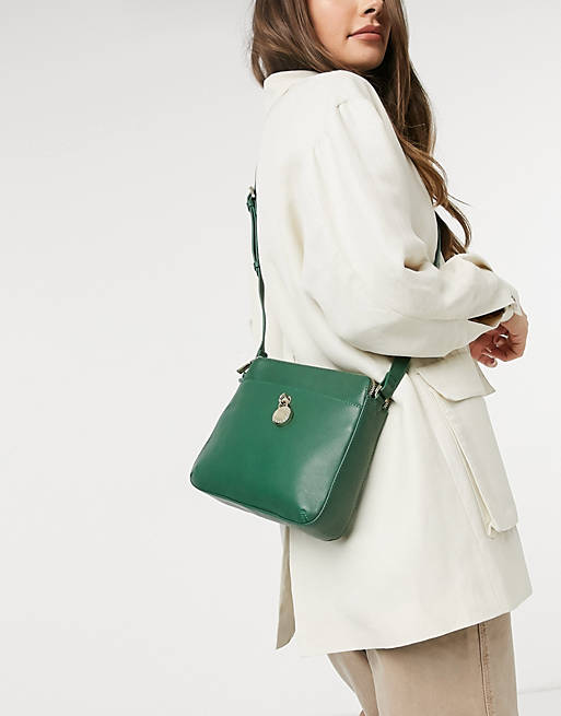 Paul Costelloe leather cross body bag with gold hardware in green | ASOS