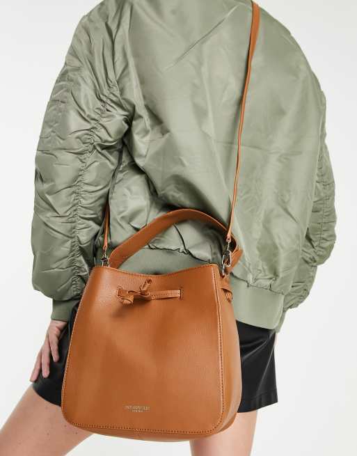 Paul Costelloe leather crossbody bucket bag in tan