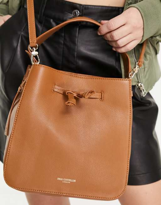 Paul Costelloe leather crossbody bucket bag in tan