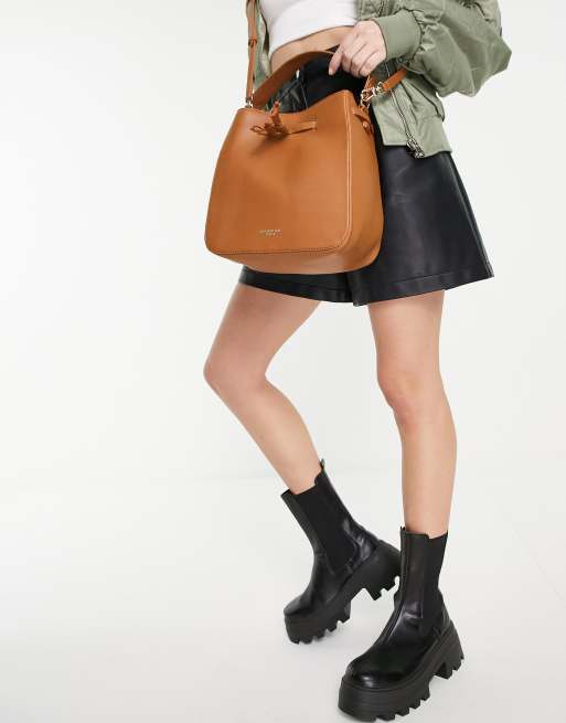 Paul Costelloe leather crossbody bucket bag in tan